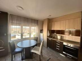 AM APARTMENTS